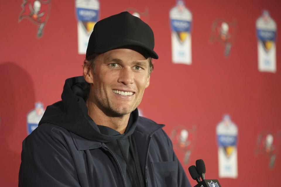 Tampa Bay Buccaneers quarterback Tom Brady speaks during a news conference following an NFL football game against the Seattle Seahawks, Sunday, Nov. 13, 2022, in Munich, Germany. (AP Photo/Matthias Schrader)