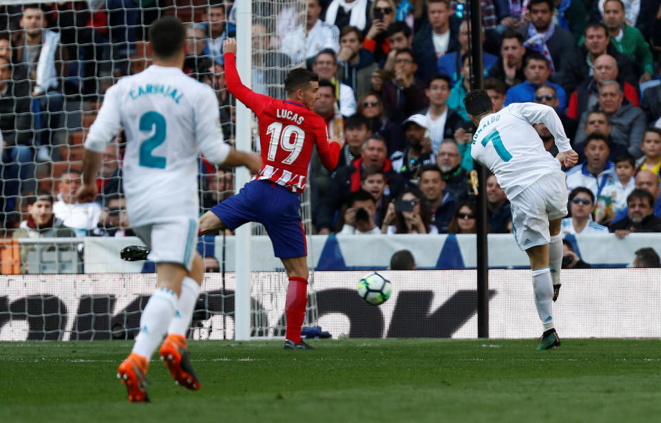 Cristiano Ronaldo scores the first goal of the Madrid Derby with a back-post volley. The game between Real Madrid and Atletico Madrid ended 1-1. (Reuters)