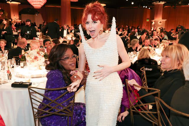 <p>Christopher Polk/Golden Globes 2024/Golden Globes 2024 via Getty</p> Oprah Winfrey and Natasha Lyonne