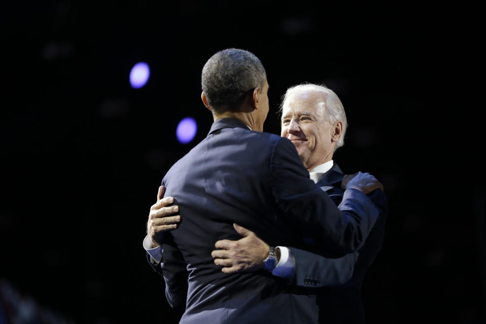 President Barack Obama and Vice President Joe Biden embrace on stage during an election night party, Wednesday, Nov. 7, 2012, in Chicago. Obama defeated Republican challenger former Massachusetts Gov. Mitt Romney.(AP Photo/Matt Rourke)