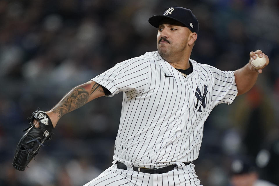 FILE - New York Yankees starting pitcher Nestor Cortes delivers against the Houston Astros during the first inning of Game 4 of an American League Championship baseball series, Oct. 23, 2022, in New York. Cortes will miss the March 2023 World Baseball Classic due to a strained right hamstring but has not ruled out being ready for the start of the regular season. (AP Photo/John Minchillo, File)