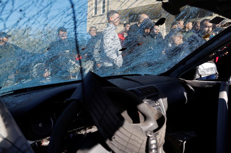 A view of a part of a damaged car where three Palestinian militants were killed during an Israeli operation, near Jenin