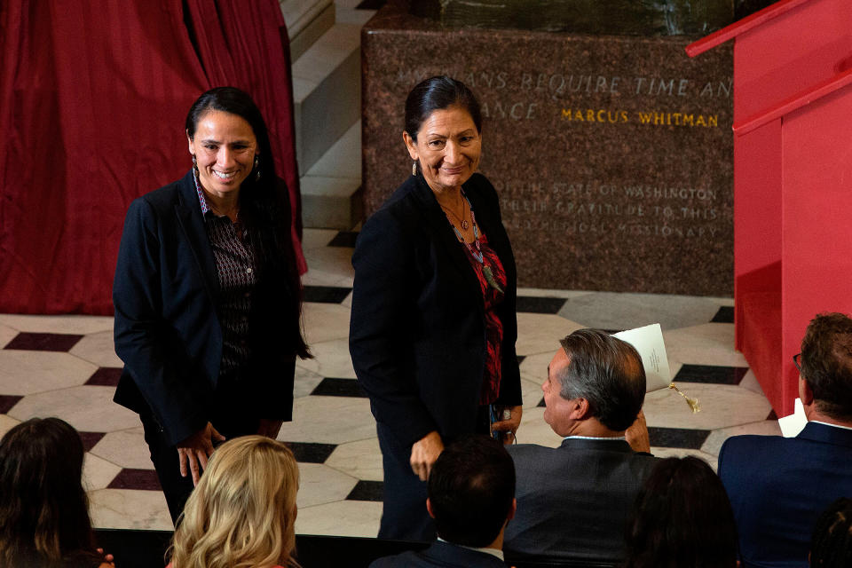 U.S. Representatives Sharice Davids, left, and Deb Haaland are recognized as the first Native American women elected to Congress during a dedication and unveiling ceremony for a statue of Ponca Chief Standing Bear of Nebraska on Capitol Hill in Washington, DC, on Sept. 18, 2019. | Alastair Pike— AFP/Getty Images