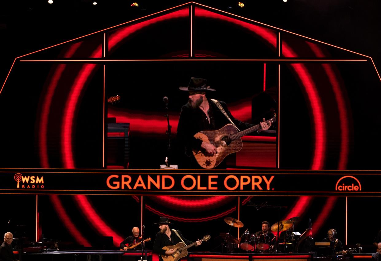 Jackson Dean performs during the Opry NextStage Live concert hosted by Lainey Wilson at the Grand Ole Opry in Nashville, Tenn., Wednesday, Dec. 6, 2023.