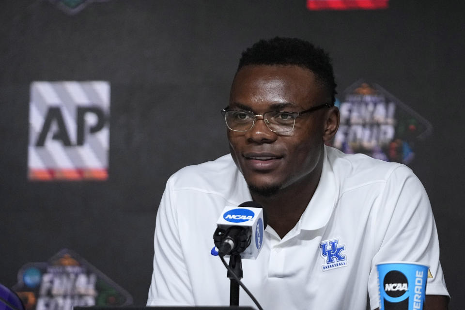 FILE - Oscar Tshiebwe of Kentucky speaks as he is introduced as The Associated Press men's basketball player of the year, in New Orleans, Friday, April 1, 2022. Tshiebwe was a unanimous selection to The Associated Press preseason All-America team, Monday, Oct. 24, 2022. (AP Photo/Gerald Herbert, File)