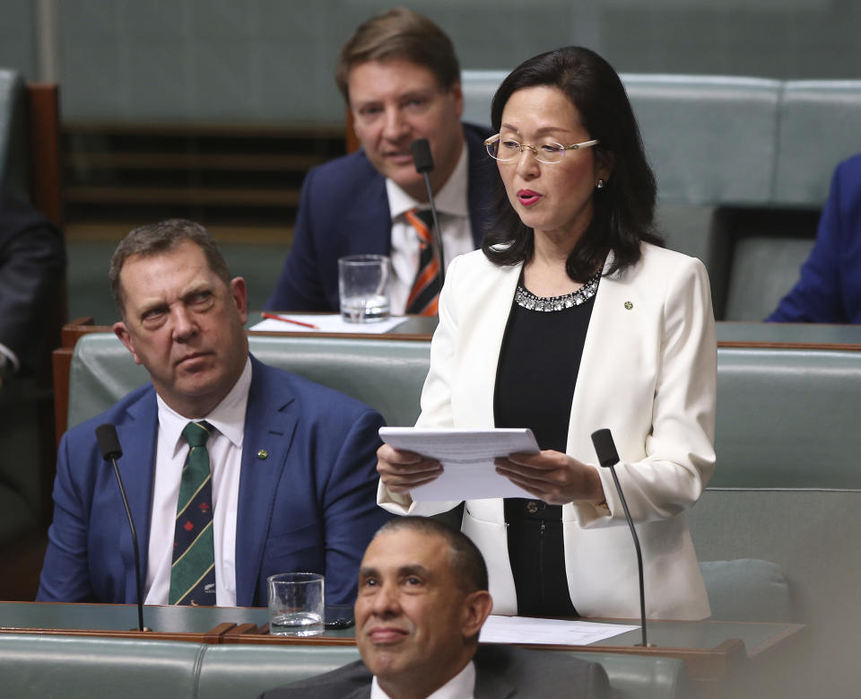 In this July 25, 2019, photo, Gladys Liu, the first Chinese-born lawmaker to be elected to Australia's Parliament, addresses the House of Representatives in Canberra, Australia. Liu has come under attack this week over her links to the Chinese foreign influence network. (AP Photo/Rod McGuirk)