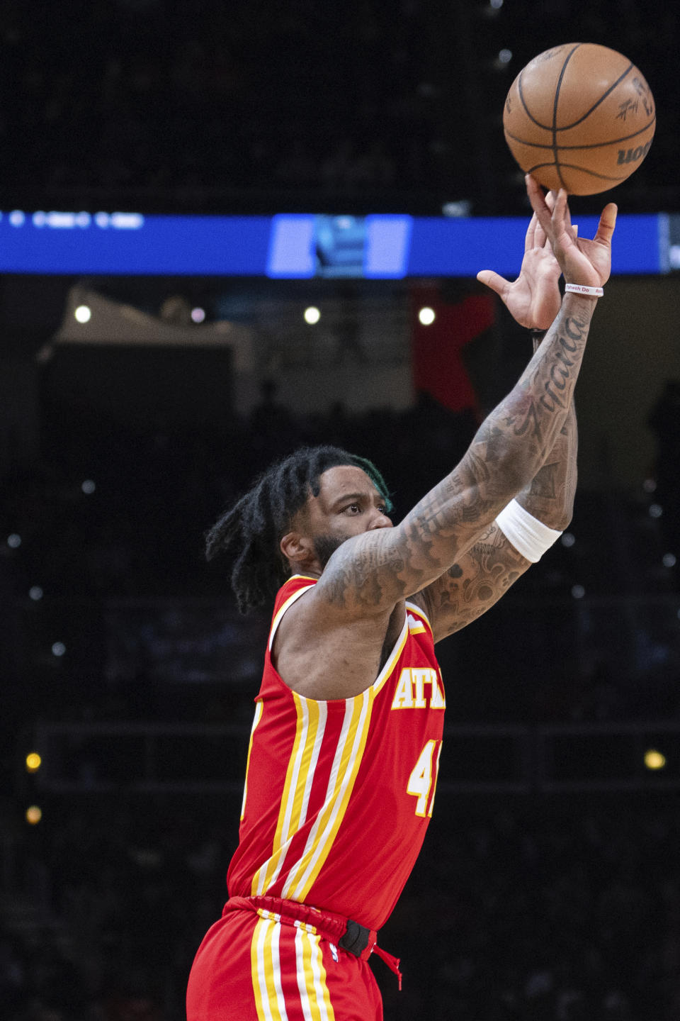 Atlanta Hawks forward Saddiq Bey (41) shoots a three pointer during the first half of an NBA basketball game against the Orlando Magic, Sunday, Feb 25, 2024, in Atlanta. (AP Photo/Hakim Wright Sr.)