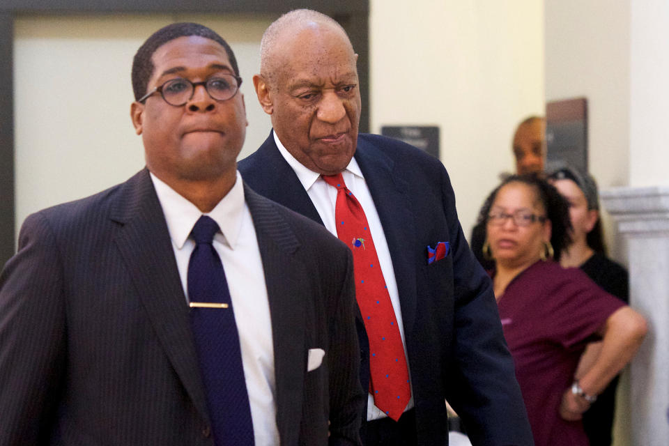 <p>Bill Cosby walks through the Montgomery County Courthouse with his publicist, Andrew Wyatt, after being found guilty on all counts in his sexual assault retrial, in Norristown, Pa., April 26, 2018. (Photo: Mark Makela/Pool via Reuters) </p>