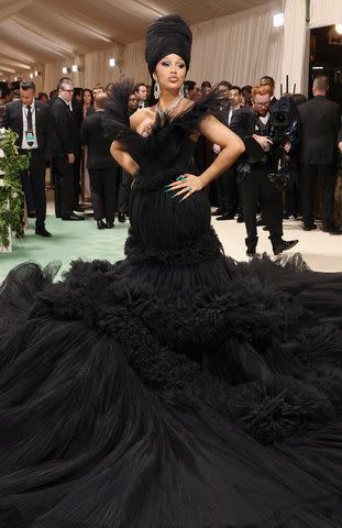 <p>John Shearer/WireImage</p> Cardi B attends the 2024 Met Gala