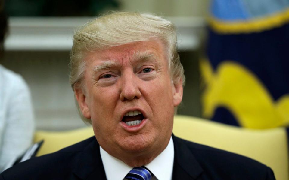 President Donald Trump speaks in the Oval Office of the White House