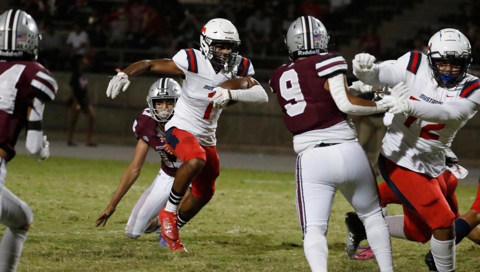 Tulare Western's Jaanveer Singh looks for running room against Mt. Whitney during their football game at Mineral King Bowl in Visalia, Calif., Friday, Sept. 1, 2023.