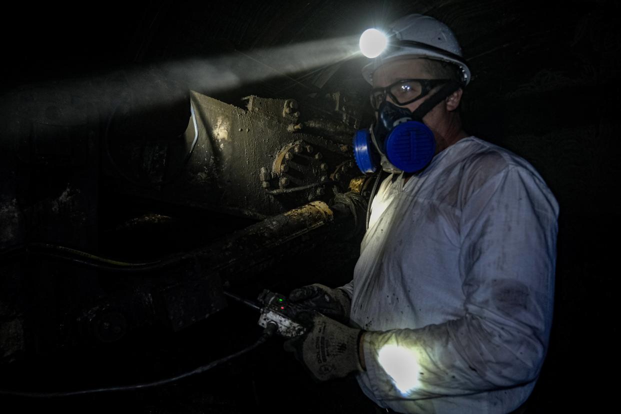 A Ukrainian miner works in a shaft of a coal mine in Pavlohrad, eastern Ukraine (EPA)