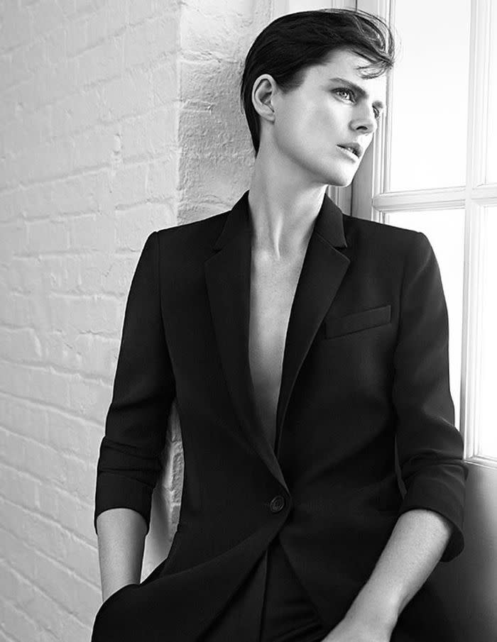 Dewy skin looks just right paired with this androgynous look. Photographed by Lachlan Bailey.