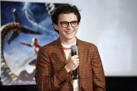 <p>Tom Holland greets the crowd at the Columbia Pictures Trailer Launch Fan Event of <em>Spider-Man: No Way Home</em> at Regal Sherman Oaks in California on Nov. 16.</p>