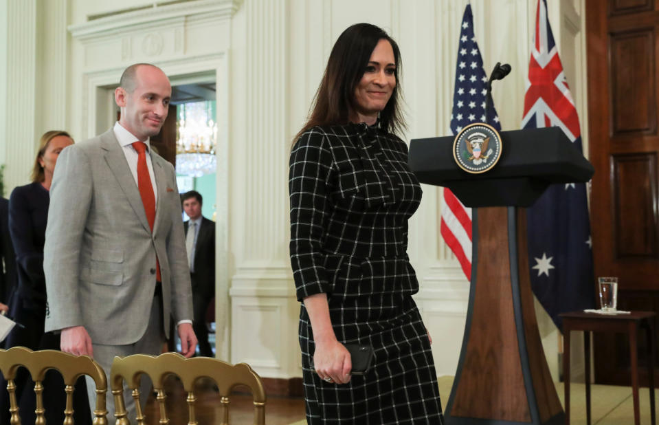 White House senior adviser Stephen Miller and Press Secretary Stephanie Grisham arrive for a joint news conference by Australia's Prime Minister Scott Morrison and U.S. President Donald Trump in the East Room of the White House in Washington, U.S., September 20, 2019. REUTERS/Jonathan Ernst