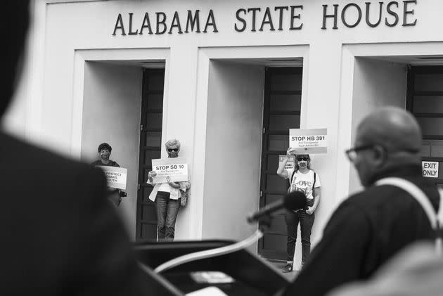 Opponents of several bills targeting transgender youth attend a rally at the Alabama State House on March 30, 2021, in Montgomery. (Photo: Julie Bennett via Getty Images)