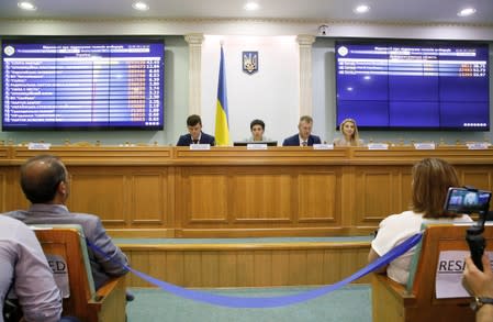 Members of the Central Electoral Commission of Ukraine attend a session in Kiev