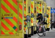 Ambulances parked amid the COVID-19 pandemic outside the Royal London Hospital in London
