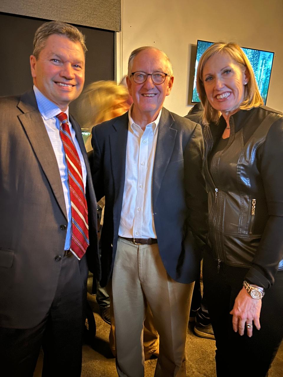 From left, Brian and Susie Heinrich stand with state Rep. John Smithee at his watch party held during the Texas primary election on Super Tuesday at the Cask & Cork at Town Square in Amarillo.