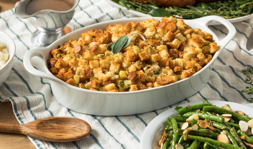 Not just for Thanksgiving, stuffing in the oven makes your holiday home smell great—and on the table is always a hit. (Photo: Getty)