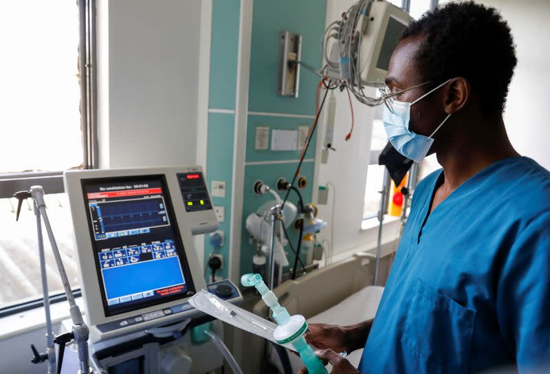 A medical staff member demonstrates how to activate a respirator as the hospital prepares for the coronavirus disease (COVID-19) outbreak, at the Karen hospital near Nairobi