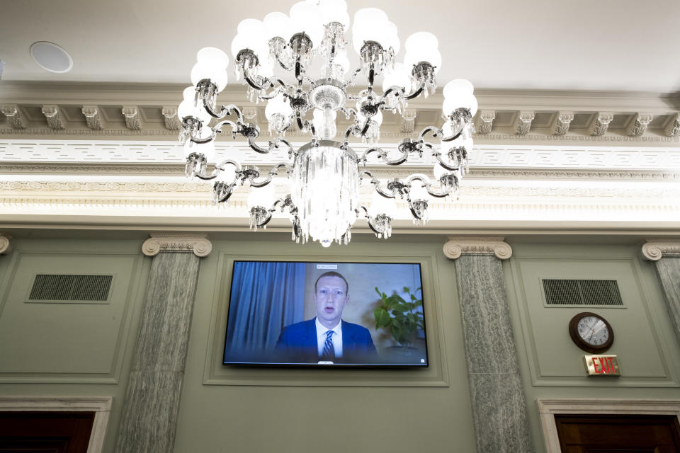 WASHINGTON, DC - OCTOBER 28: CEO of Facebook Mark Zuckerberg appears on a monitor as he testifies remotely during the Senate Commerce, Science, and Transportation Committee hearing 'Does Section 230's Sweeping Immunity Enable Big Tech Bad Behavior?', on Capitol Hill, October 28, 2020 in Washington, DC. CEO of Twitter Jack Dorsey; CEO of Alphabet Inc. and its subsidiary Google LLC, Sundar Pichai; and CEO of Facebook Mark Zuckerberg all testified virtually at the hearing. Section 230 of the Communications Decency Act guarantees that tech companies can not be sued for content on their platforms, but the Justice Department has suggested limiting this legislation. (Photo by Michael Reynolds-Pool/Getty Images)