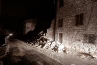 Rescuers working through the night and in the rain struggled to assess the full extent of the disaster after twin earthquakes rocked central Italy