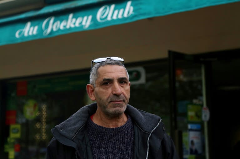 Amar Salhi outside his bar in Sevran, northeast of Paris, on April 13, 2017