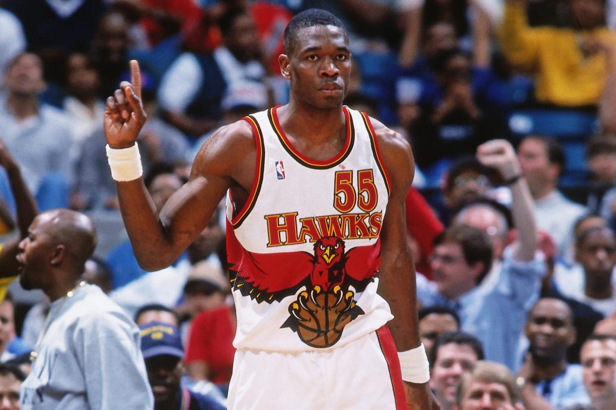 ATLANTA, GA - APRIL 9: Dikembe Mutombo #55 of the Atlanta Hawks against the Indiana Pacers on April 9, 1998 at The Omni in Atlanta, Georgia. NOTE TO USER: User expressly acknowledges and agrees that, by downloading and or using this photograph, User is consenting to the terms and conditions of the Getty Images License Agreement. Mandatory Copyright Notice: Copyright 1998 NBAE (Photo by Scott Cunningham/NBAE via Getty Images) ATLANTA, GA - APRIL 7: Dikembe Mutombo #55 of the Atlanta Hawks waves his finger against the New York Knicks on April 7, 1998 at The Omni in Atlanta, Georgia. NOTE TO USER: User expressly acknowledges and agrees that, by downloading and or using this photograph, User is consenting to the terms and conditions of the Getty Images License Agreement. Mandatory Copyright Notice: Copyright 1998 NBAE (Photo by Scott Cunningham/NBAE via Getty Images)