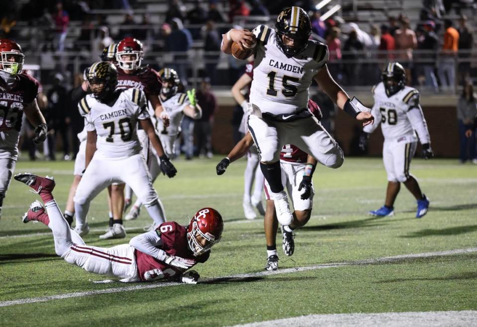 Grayson White (15) of Camden leaps into the end zone during a 2-point conversion during Brookland-Cayce’s game against Camden in the Class 3A Lower State championship game in Cayce on Friday, November 24, 2023.