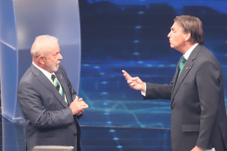 Lula y Bolsonaro, durante el debate del 16 de octubre
