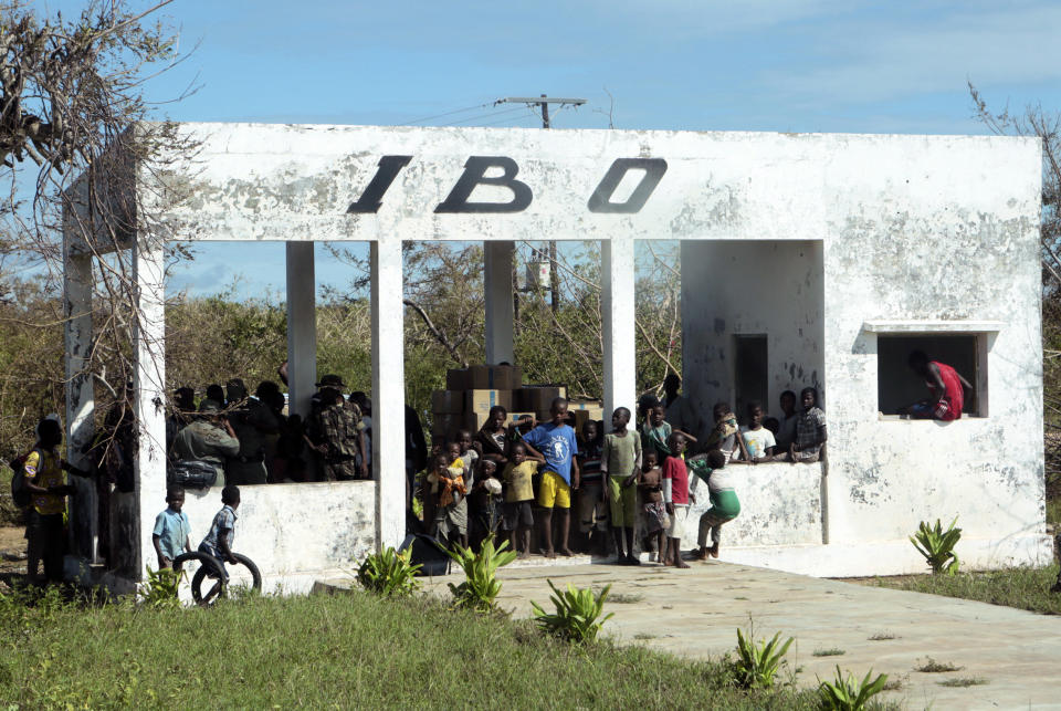 Children are seen at the airstrip on Ibo island north of Pemba city in Mozambique, Wednesday, May, 1, 2019. The government has said more than 40 people have died after the cyclone made landfall on Thursday, and the humanitarian situation in Pemba and other areas is dire. More than 22 inches (55 centimeters) of rain have fallen in Pemba since Kenneth arrived just six weeks after Cyclone Idai tore into central Mozambique. (AP Photo/Tsvangirayi Mukwazhi)