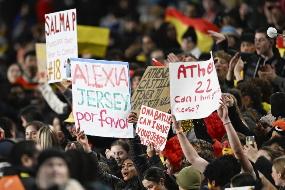 Spanish fans celebrate after the Women's World Cup semifinal soccer match between Sweden and Spain at Eden Park in Auckland, New Zealand, Tuesday, Aug. 15, 2023. (AP Photo/Andrew Cornaga)