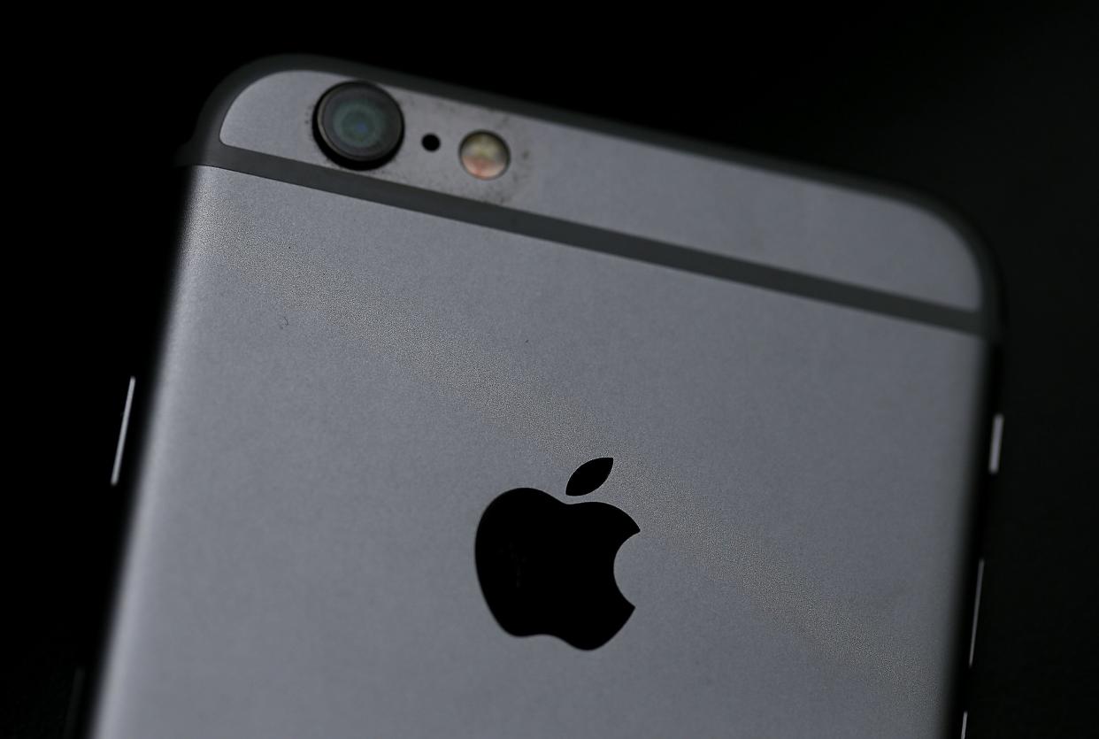 Apple logo is displayed on an iPhone 6 on July 21, 2015 in San Francisco, California (Getty Images)