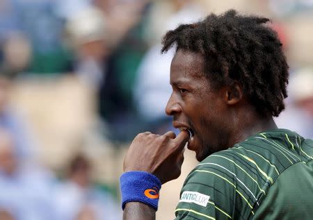 Gael Monfils of France reacts during his men's singles semi-final tennis match against Tomas Berdych of the Czech Republic at the Monte Carlo Masters in Monaco, April 18, 2015. REUTERS/Jean-Paul Pelissier