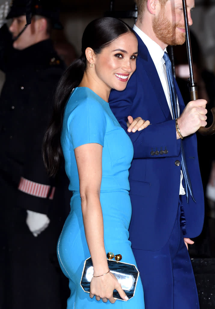 Meghan beamed as she returned to the UK for her first public appearance since announcing the couple were stepping down from royal duties. (Getty Images)