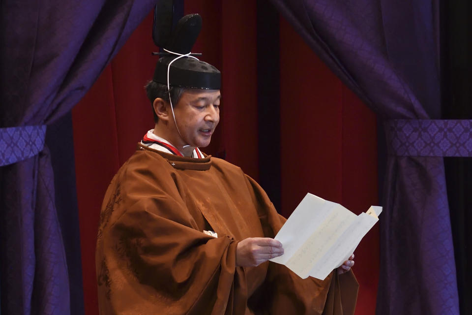 Emperor Naruhito delivers his speech during the enthronement ceremony where he officially proclaims his ascension to the Chrysanthemum Throne at the Imperial Palace in Tokyo on Tuesday, Oct. 22, 2019. (Kazuhiro Nogi/Pool Photo via AP)