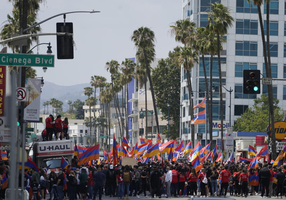 Armemian-Americans hold a rally protesting against the Armenian genocide in Beverly Hills, Calif., Saturday, April 24, 2021. The systematic killing and deportation of more than a million Armenians by Ottoman Empire forces in the early 20th century was "genocide," the United States formally declared on Saturday, as President Joe Biden used that precise word after the White House had avoided it for decades for fear of alienating ally Turkey. (AP Photo/Damian Dovarganes)