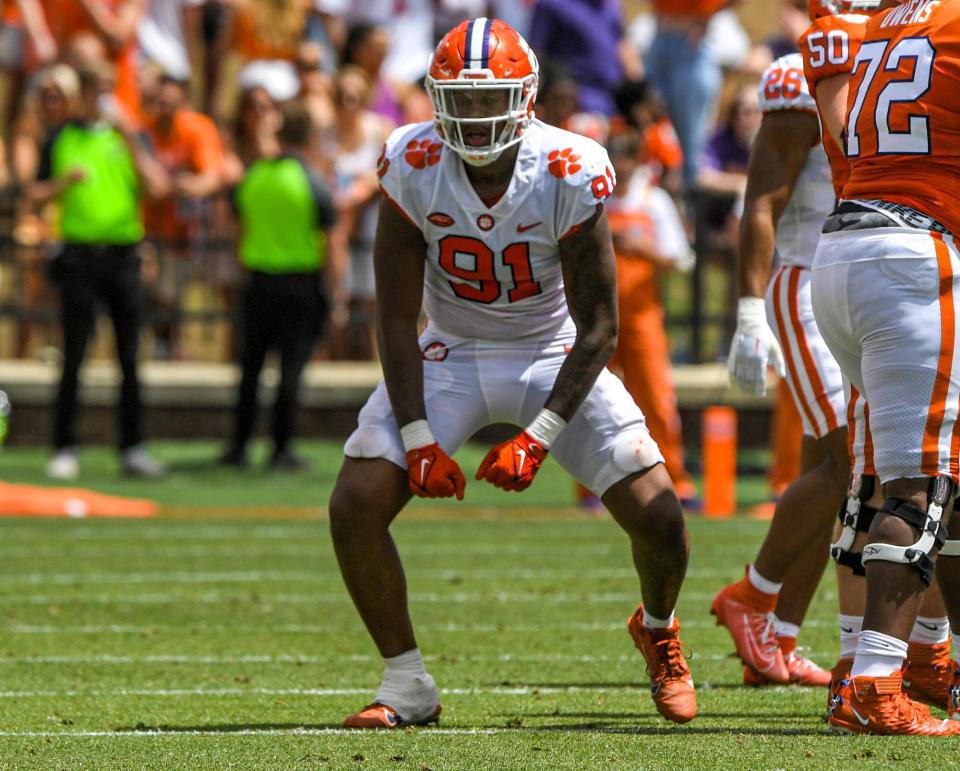 Clemson defensive end Zaire Patterson (91) reacts after a tackle at the annual Orange and White Spring game at Memorial Stadium in Clemson, S.C. Saturday, April 15, 2023. 