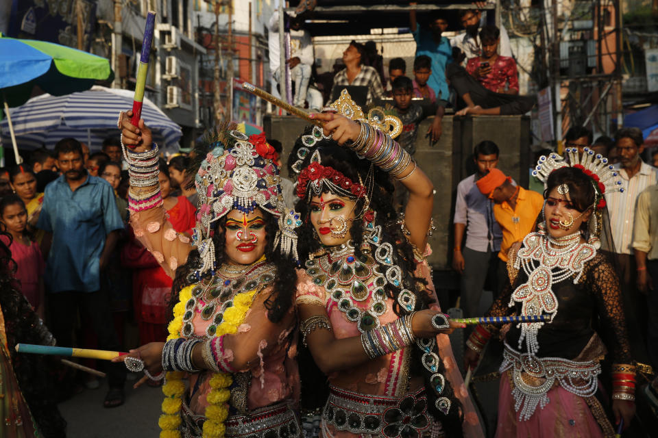 <p>Indian girls dressed as Hindu god Krishna and his consort Radha, dance in a procession as part of celebrations on the eve of Janmashtami festival in Allahabad, India, Sunday, September 2, 2018. The festival celebrates the birth of Hindu god Krishna. (AP Photo/Rajesh Kumar Singh) </p>