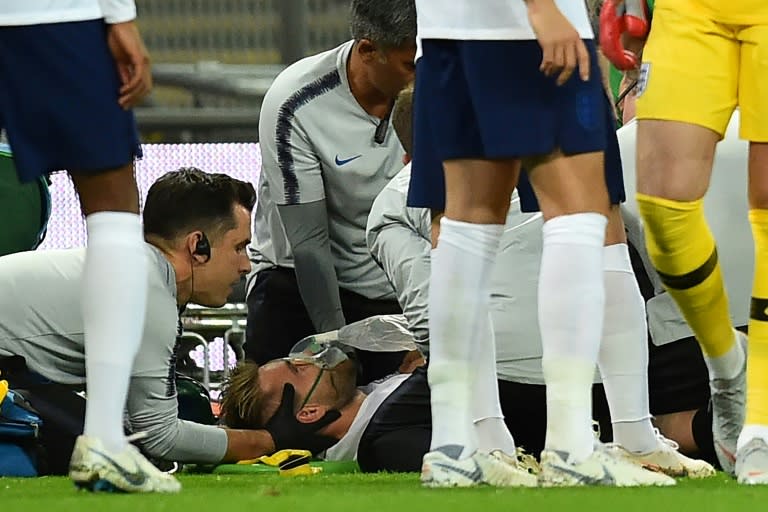 England's Luke Shaw was stretchered off with a head injury