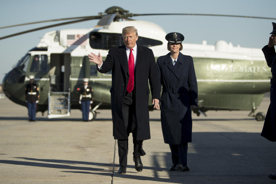 President Donald Trump walks to board Air Force One at Andrews Air Force Base, Md., Friday, Dec. 7, 2018, to travel to Kansas City, Mo., to speak at the 2018 Project Safe Neighborhoods National Conference. (AP Photo/Andrew Harnik)