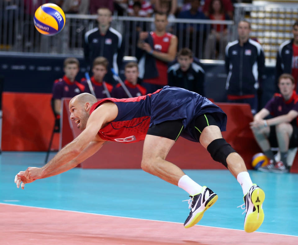 William Priddy #8 of United States dives for the ball in the first set against Serbia during Men's Volleyball on Day 2 of the London 2012 Olympic Games at Earls Court on July 29, 2012 in London, England. (Photo by Elsa/Getty Images)