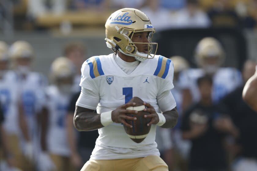 UCLA quarterback Dorian Thompson-Robinson (1) passes against California during an NCAA college football game.