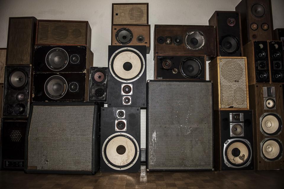 Wall of old speakers.