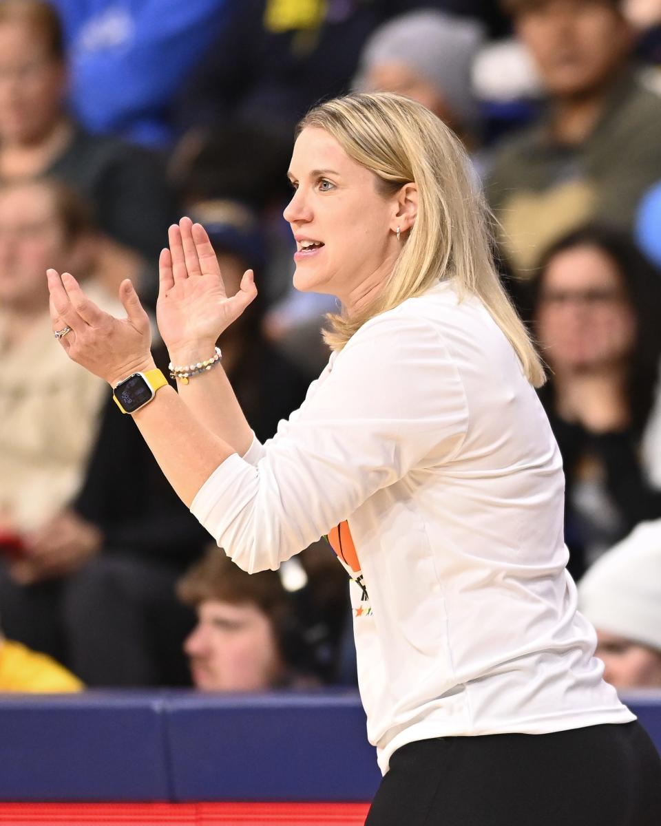 Marquette head coach Megan Duffy cheers on her team against Seton Hall in the second half of their game Tuesday, February 20, 2024, at the Al McGuire Center in the Milwaukee, Wisconsin.