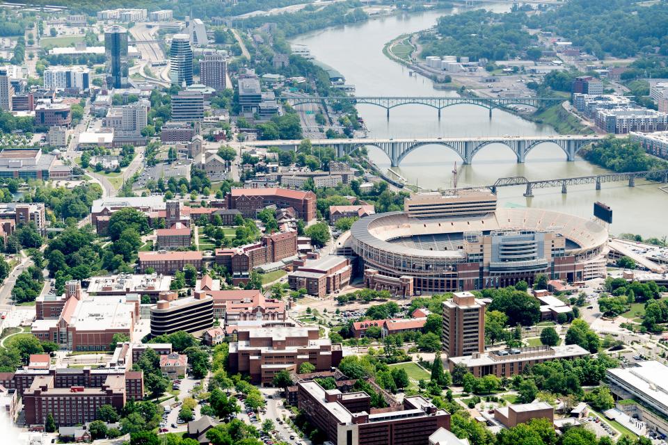 An aerial view of the University of Tennessee in Knoxville, Tennessee on Thursday, May 2, 2019. Neyland Stadium and The Hill can be seen at center, with downtown Knoxville in the background.