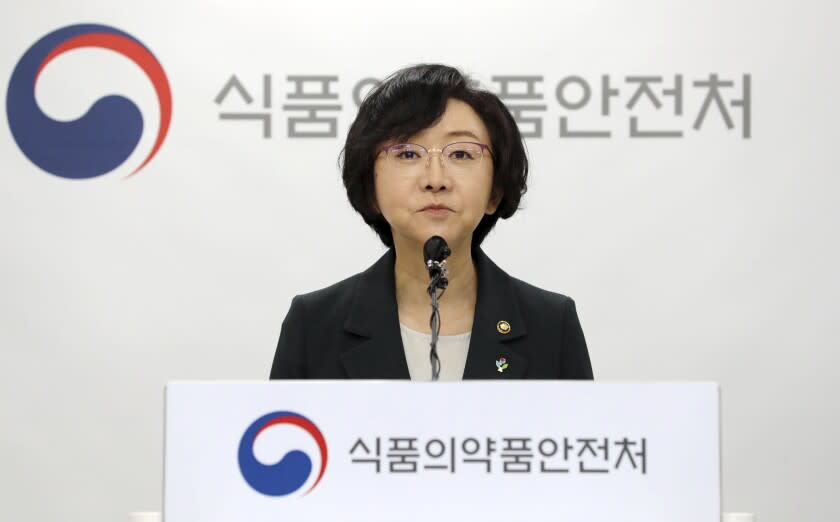 South Korean Minister of Food and Drug Safety Oh Yu-Kyoung speaks during a briefing at the ministry of Food and Drug Safety in Cheongju, South Korea, Wednesday, June 29, 2022. Health officials in South Korea on Wednesday approved the country's first domestically developed COVID-19 vaccine for people 18 years or older, adding another public health tool in the fight against a prolonged pandemic. (Chun Kyung-hwan/Yonhap via AP)