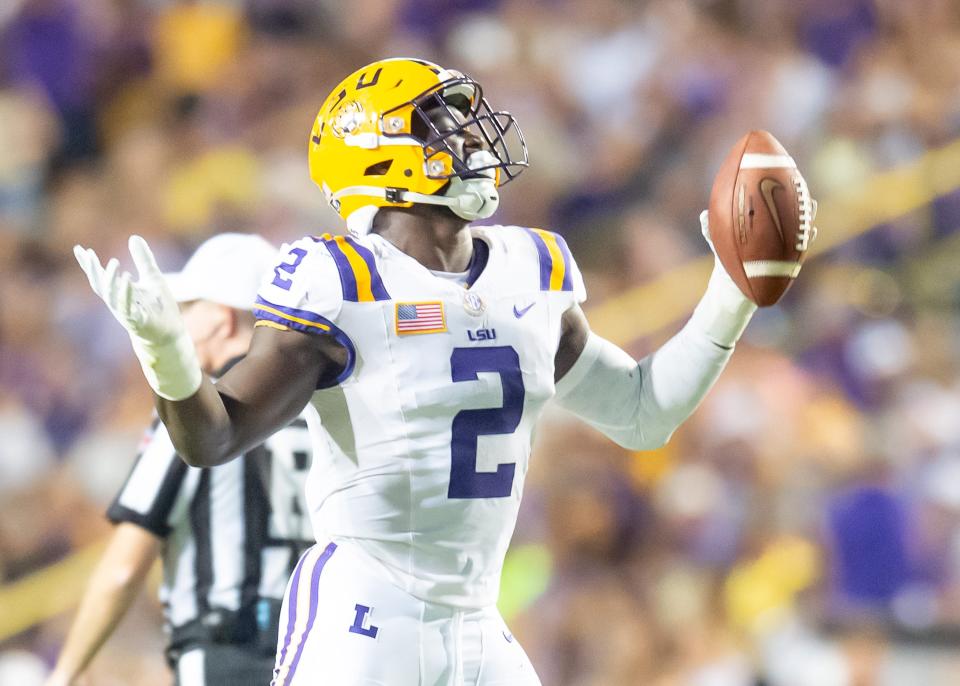 LSU's Ovie Oghoufo recovers a fumble against Army.