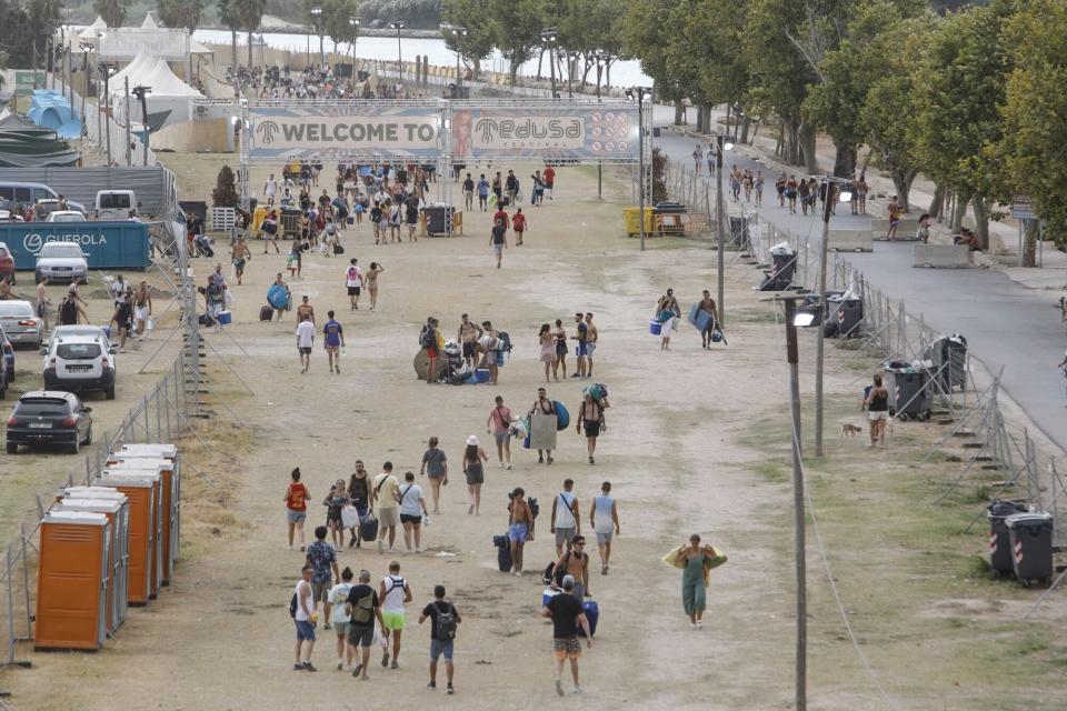 Mandatory Credit: Photo by NATXO FRANCES/EPA-EFE/Shutterstock (13089693d) Attendants leave the facilities of Medusa Music Festival after a stage partially collapsed in the early morning hours due to strong winds, in the coastal city of Cullera, Valencia, Spain, 13 August 2022. At least one person died and 17 others were injured when part of the main stage collapsed shortly after 04 a.m. local time, the regional emergency services said. At least one dead as music festival stage collapses amid strong winds in Spain, Cullera - 13 Aug 2022